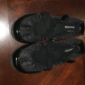 Black nylon quilted  slip-on shoe.